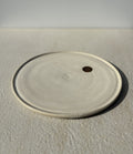 Assiette avec motif point