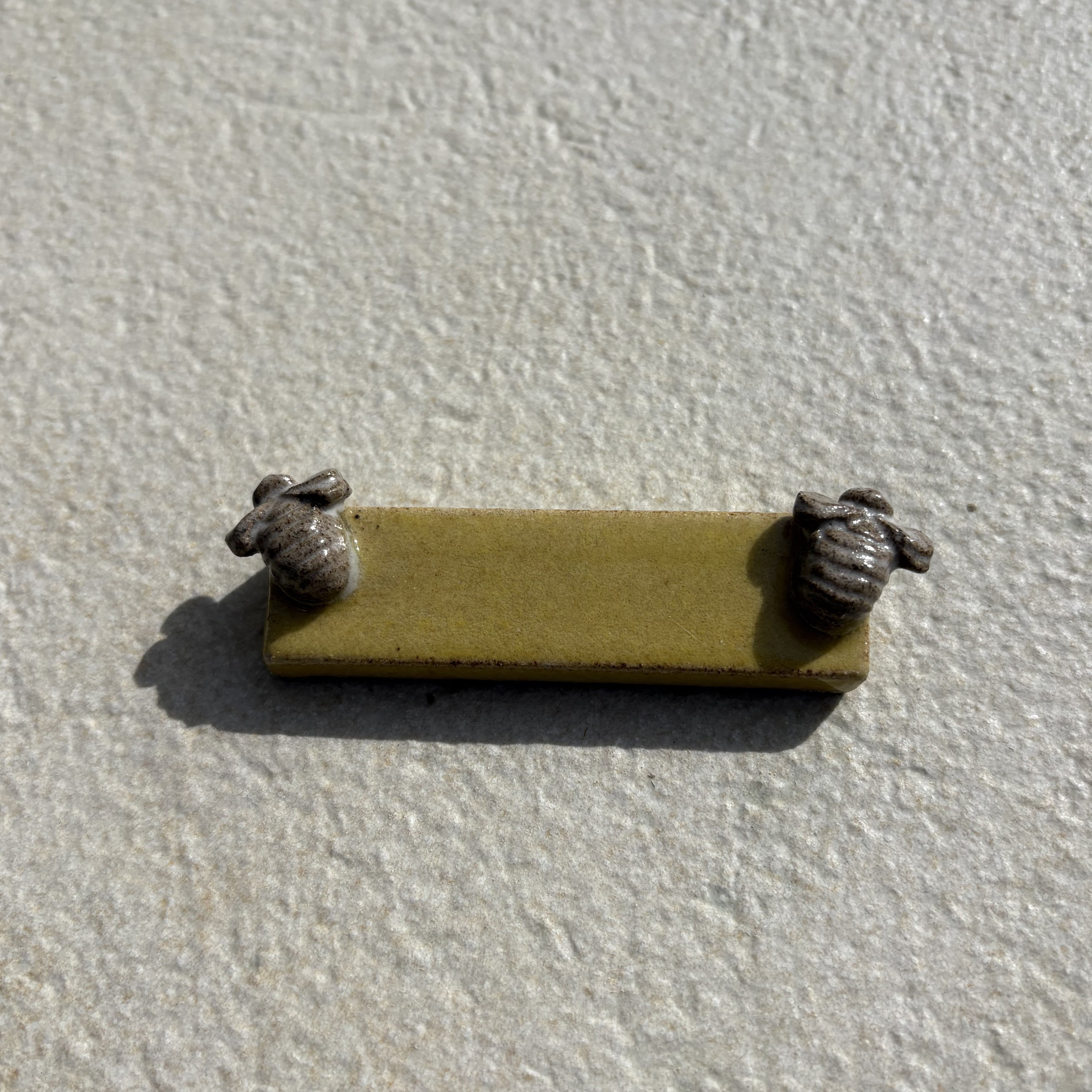 Porte couverts abeilles