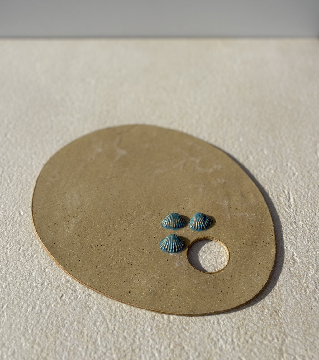 Planche à tartiner avec motifs coquillages