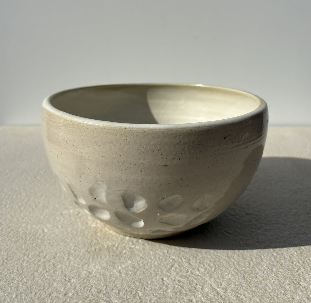 Saladier beige à motifs creux